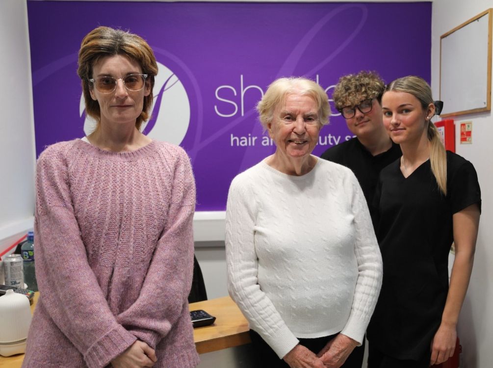 Two visitors from the RNIB and two students at Bangor Campus, where guests were treated to hair and beauty services